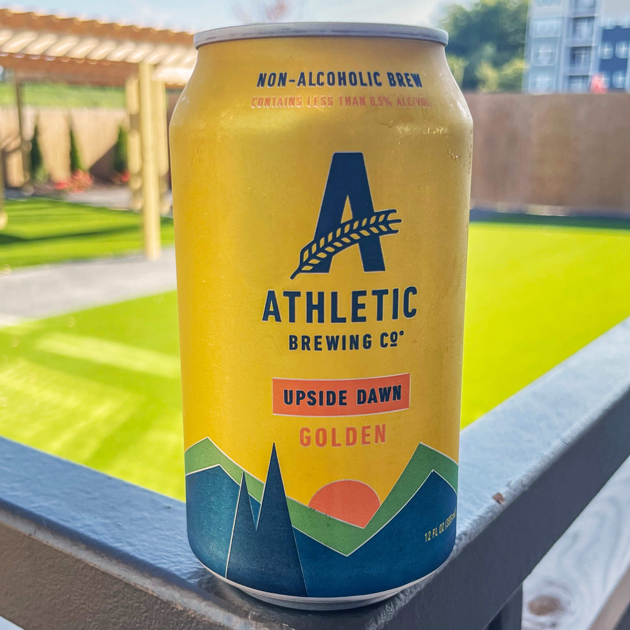 Yellow beer can from Athletic Brewing